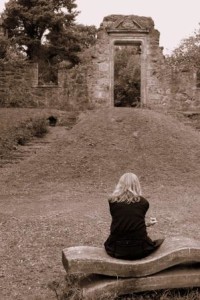 Woman reflecting on road